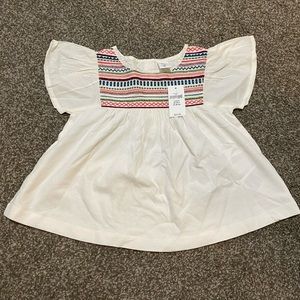 Baby Gap embroidered flutter top.